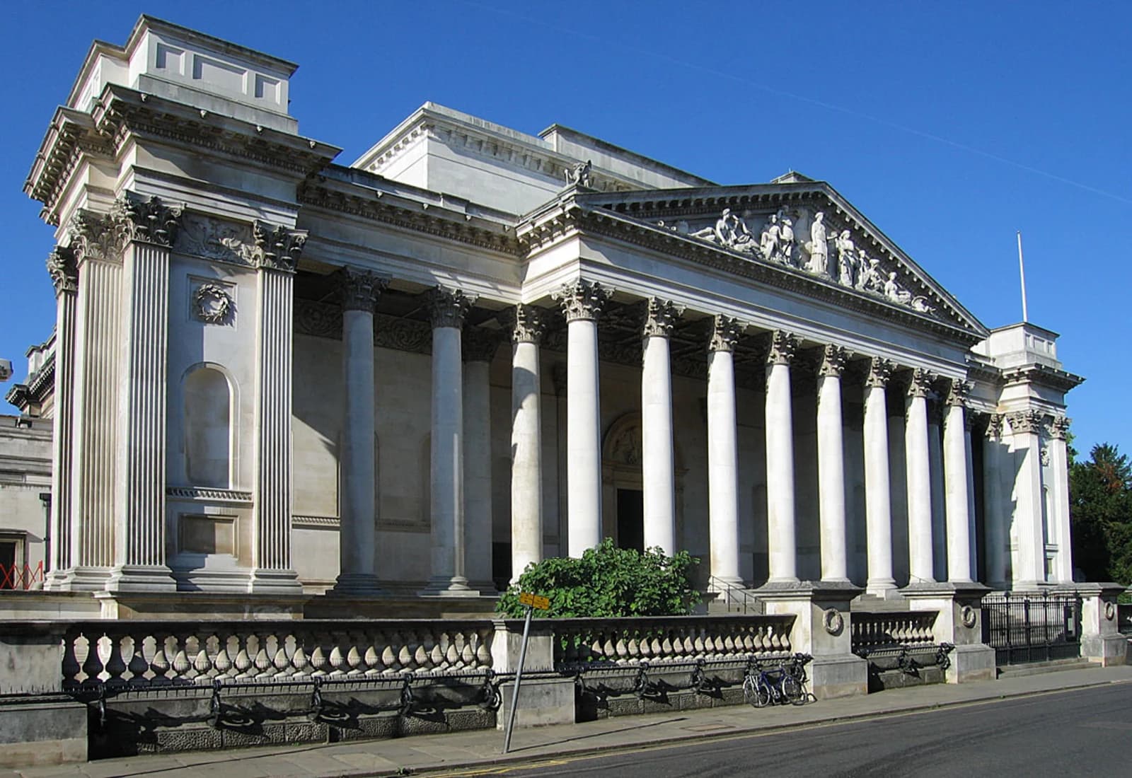 The neoclassical Corinthian portico entrance of the Fitzwilliam Museum, Cambridge