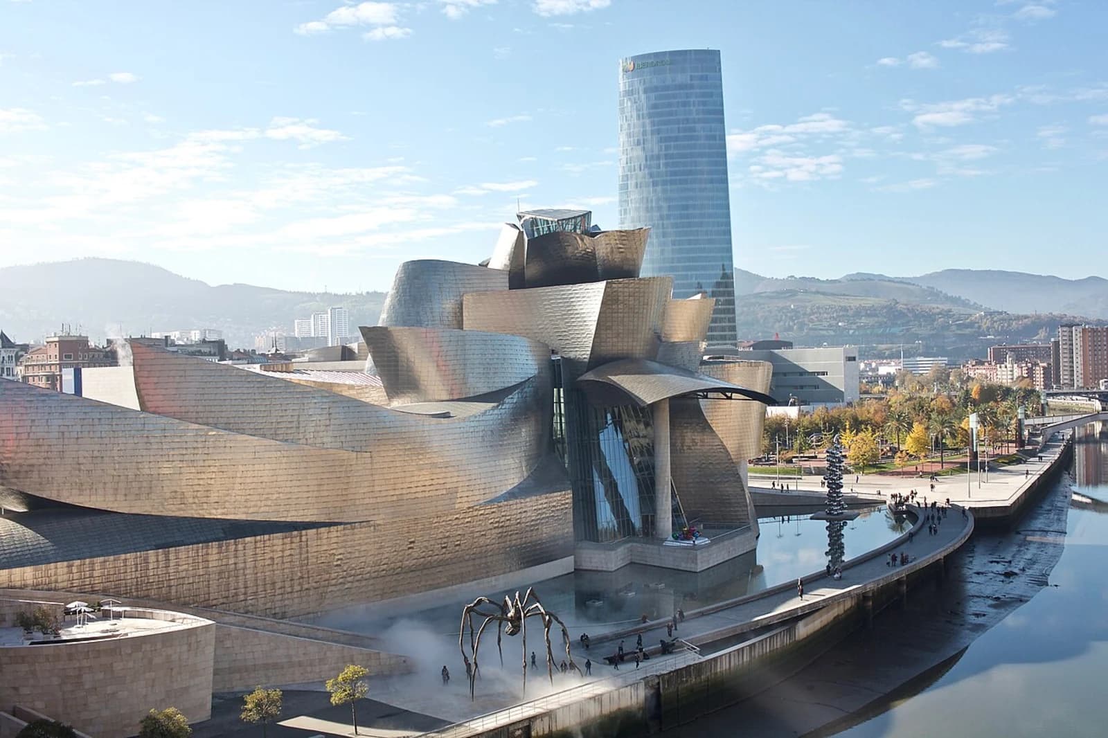 Riverside view of the Guggenheim Museum Bilbao, Frank Gehry's titanium-clad building on the Nervion river