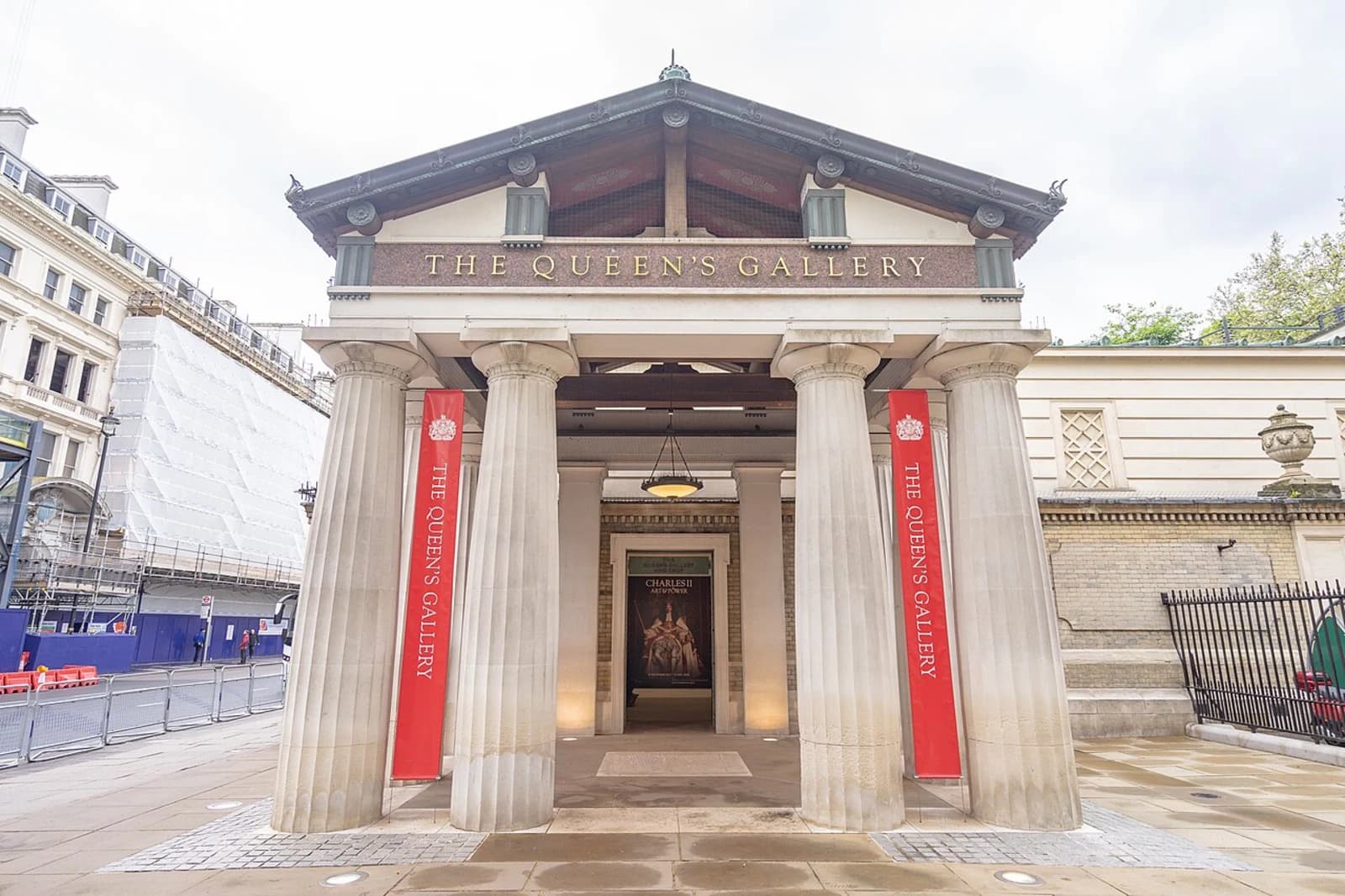 Exterior view of the entrance portico of the Queen’s Gallery at Buckingham Palace, London, showing the classical columned facade