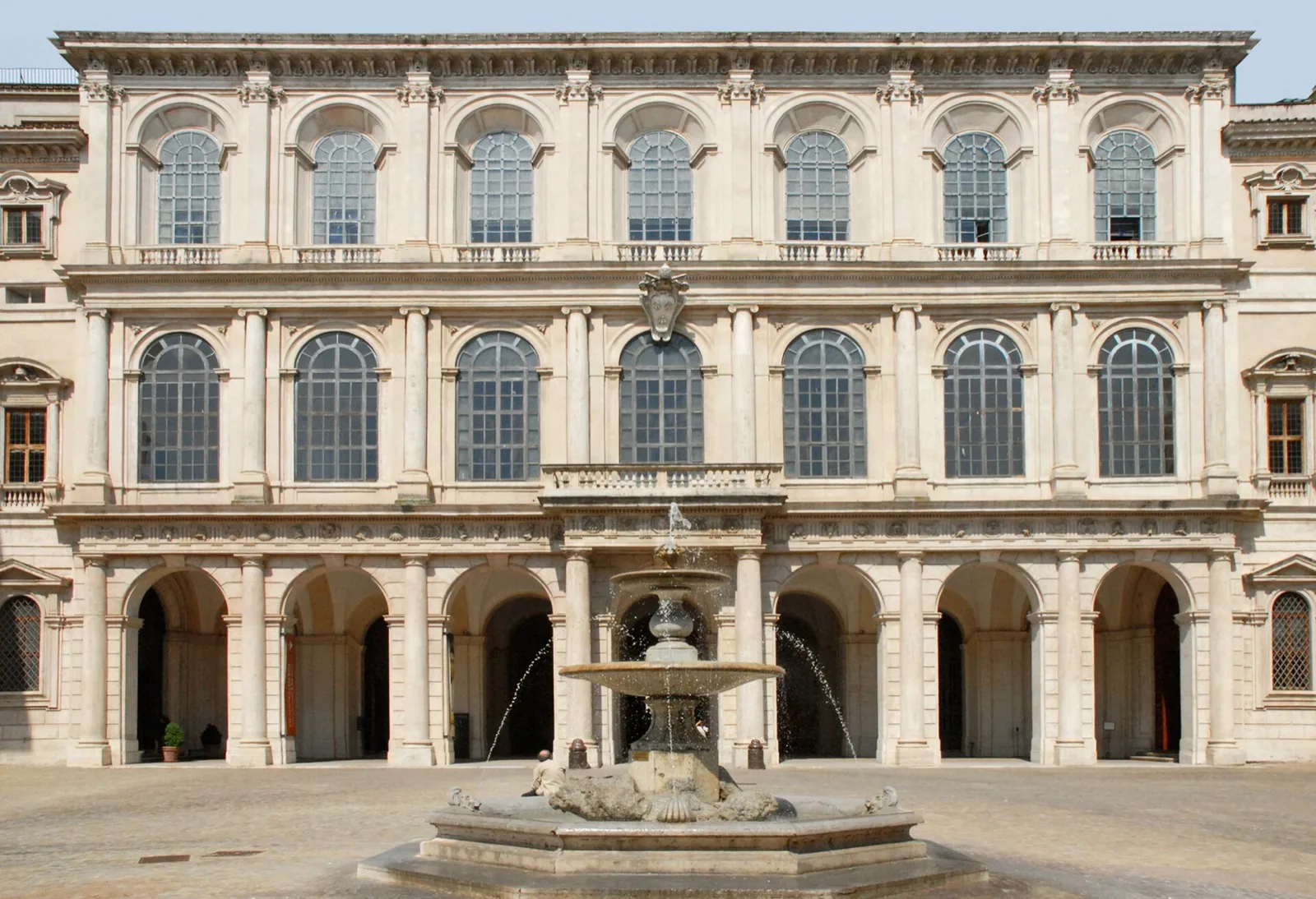 The central façade of Palazzo Barberini in Rome, designed by Carlo Maderno, Gian Lorenzo Bernini and Francesco Borromini, featuring superimposed columns of the Doric, Ionic and Corinthian orders and a grand entrance portico, home to the Galleria Nazionale d'Arte Antica.