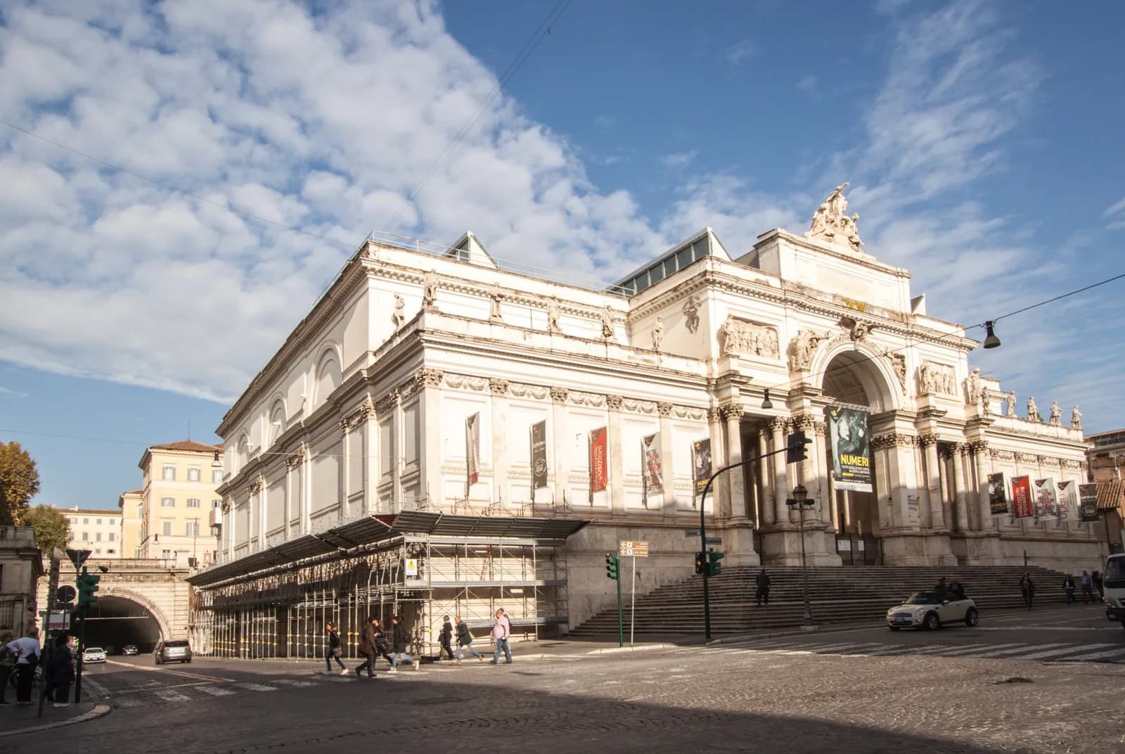 The neoclassical facade of the Palazzo delle Esposizioni on Via Nazionale in Rome, with its grand triumphal-arch entrance, columns and pediment, Rome, Italy.