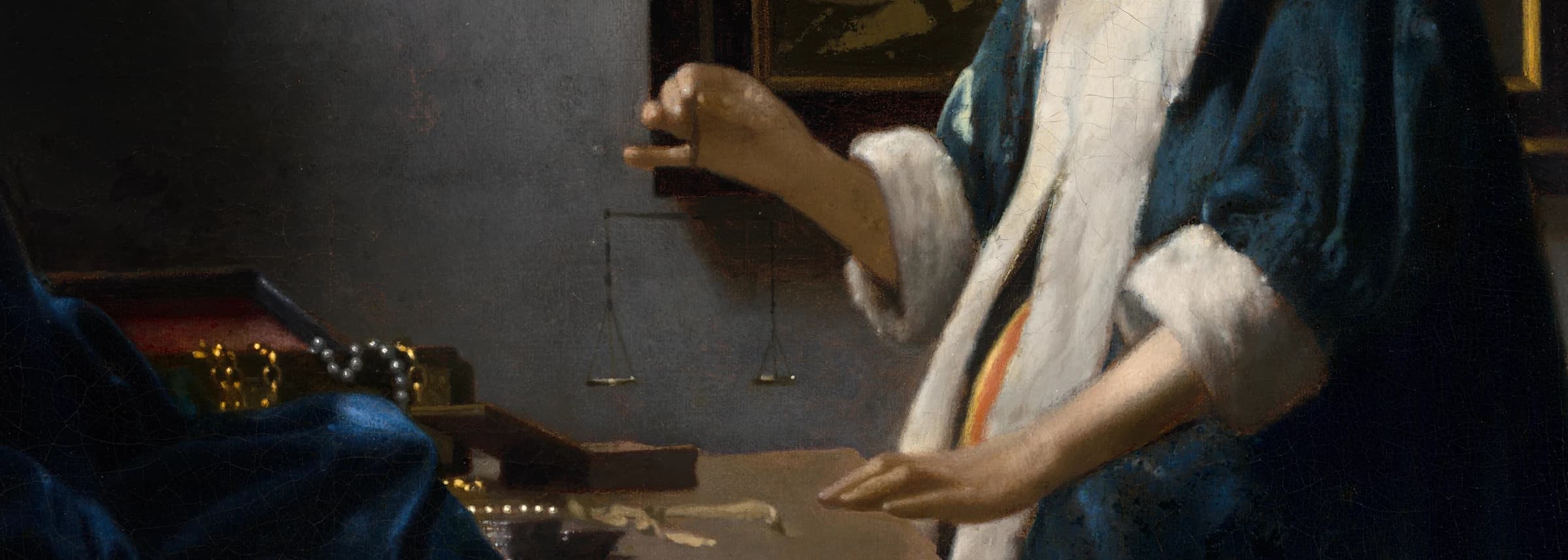 Woman Holding a Balance by Johannes Vermeer