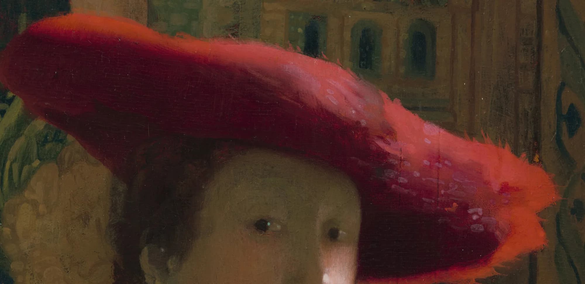 Detail of the brilliantly lit, plumed red hat in Girl with a Red Hat