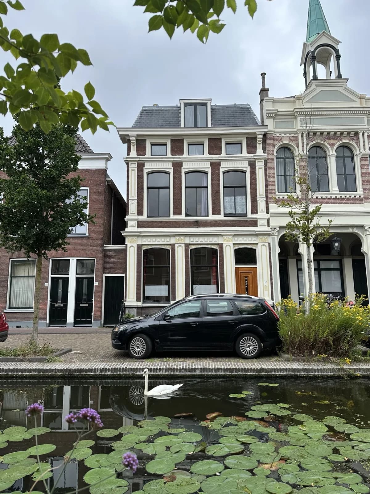 Vlamingstraat 40 in Delft seen from across the canal in 2025