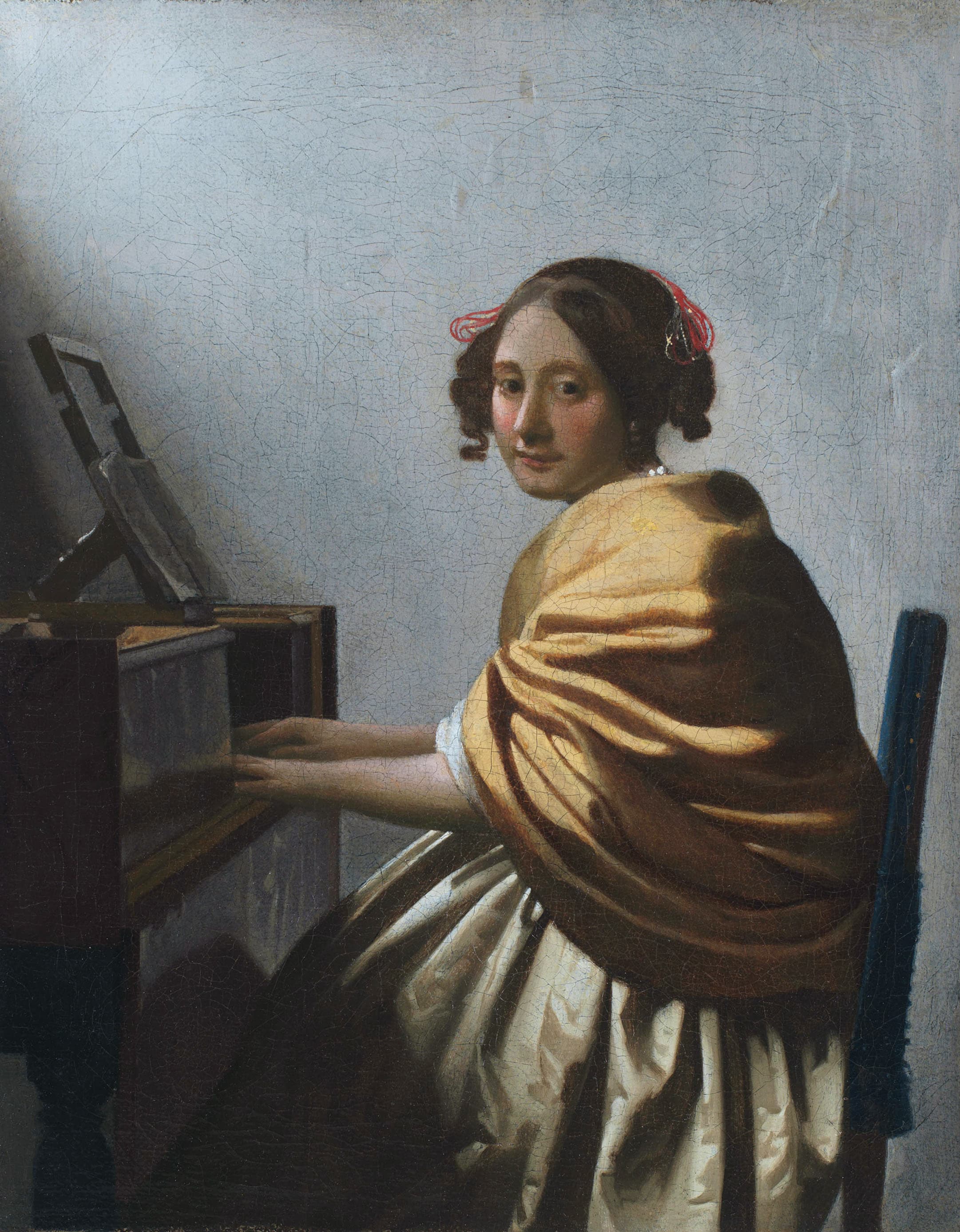 A Young Woman Seated at the Virginals attributed to Johannes Vermeer