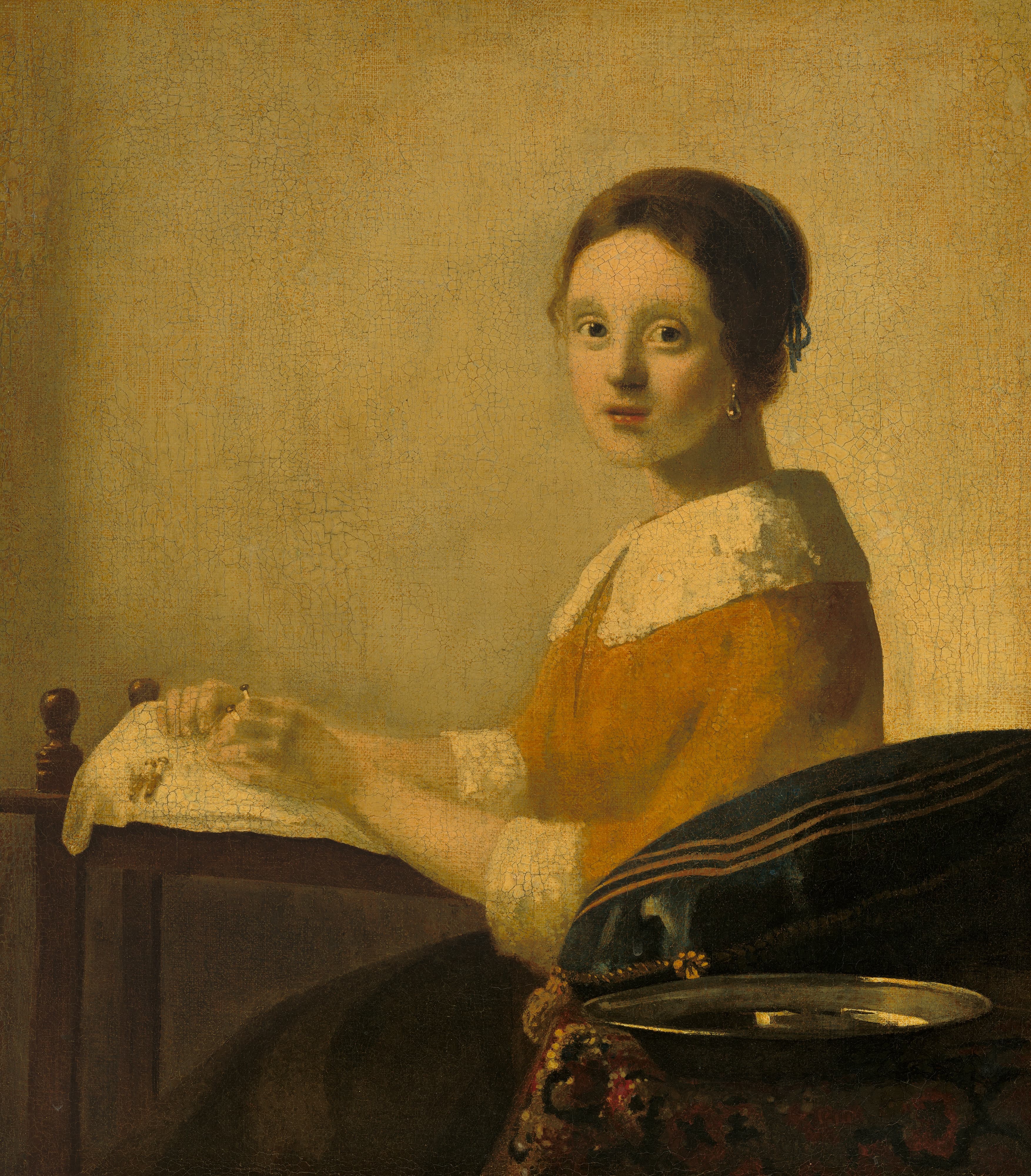 The Lacemaker, a c. 1925 forgery in the manner of Johannes Vermeer — not to be confused with Vermeer's Lacemaker in the Louvre