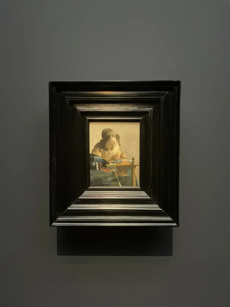 The Lacemaker hanging in the Rijksmuseum Vermeer exhibition, Amsterdam, 2023