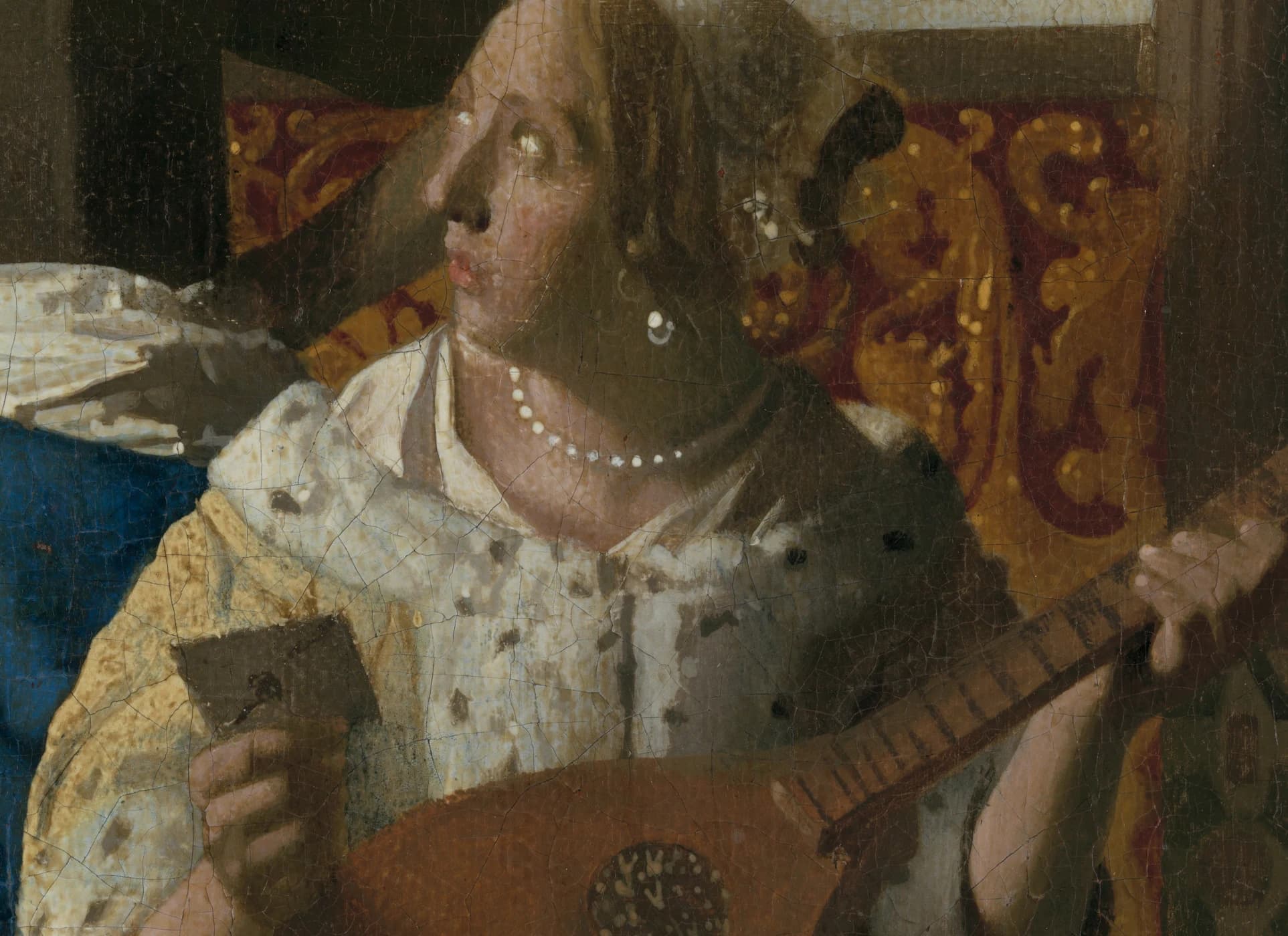 Detail of The Love Letter: the mistress holds a folded letter in her lap, a cittern resting against her, her face turned up toward the maid.