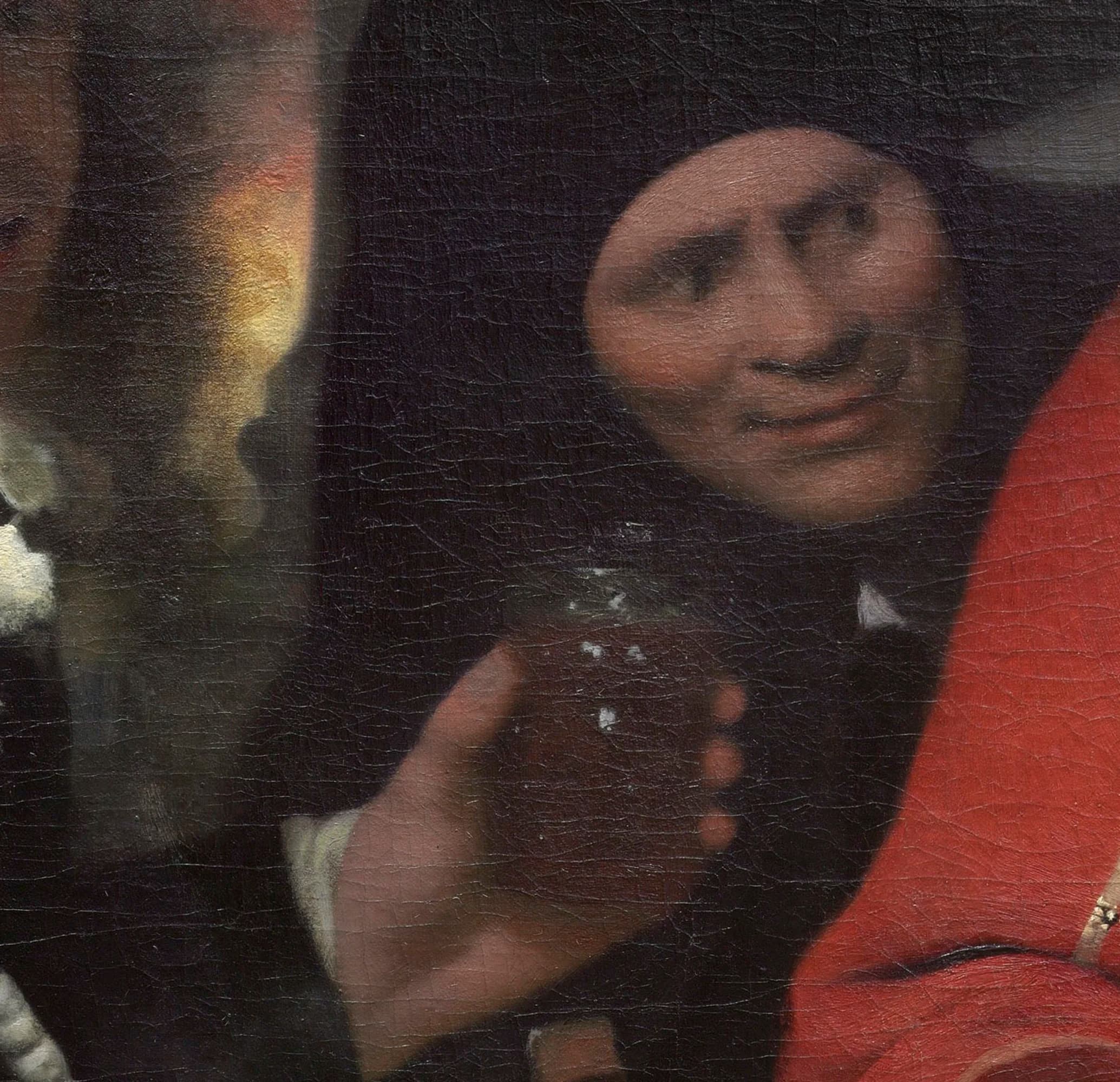 Detail of the procuress in black, smiling beside the soldier, the dark garment that now covers the area where an earlier outstretched hand was painted over
