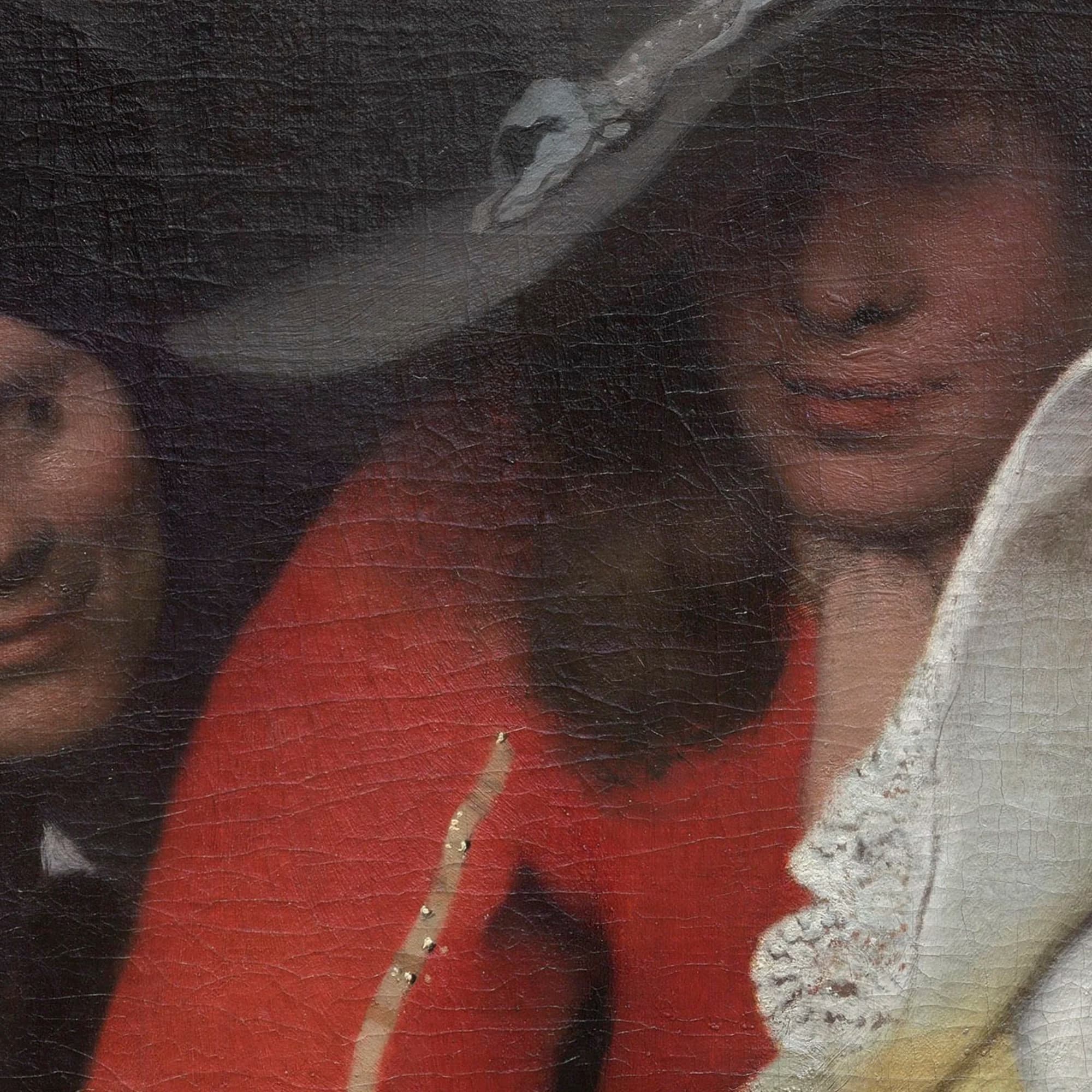 Detail of the soldier in red, his face shadowed beneath a broad-brimmed hat, looking down toward the transaction