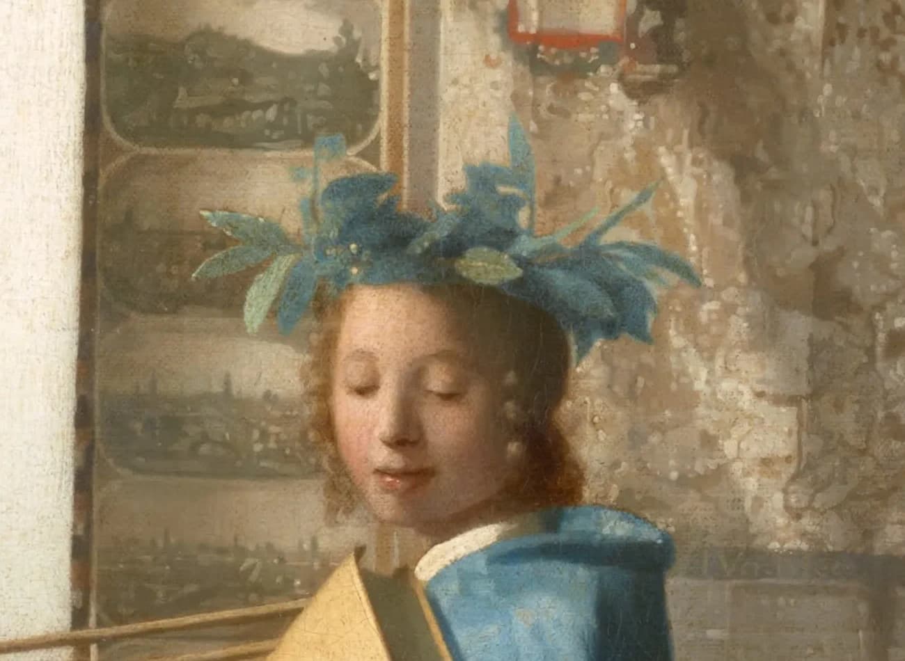 Detail of the model dressed as Clio with her laurel wreath, the worn surface of the map behind her bearing Vermeer's signature