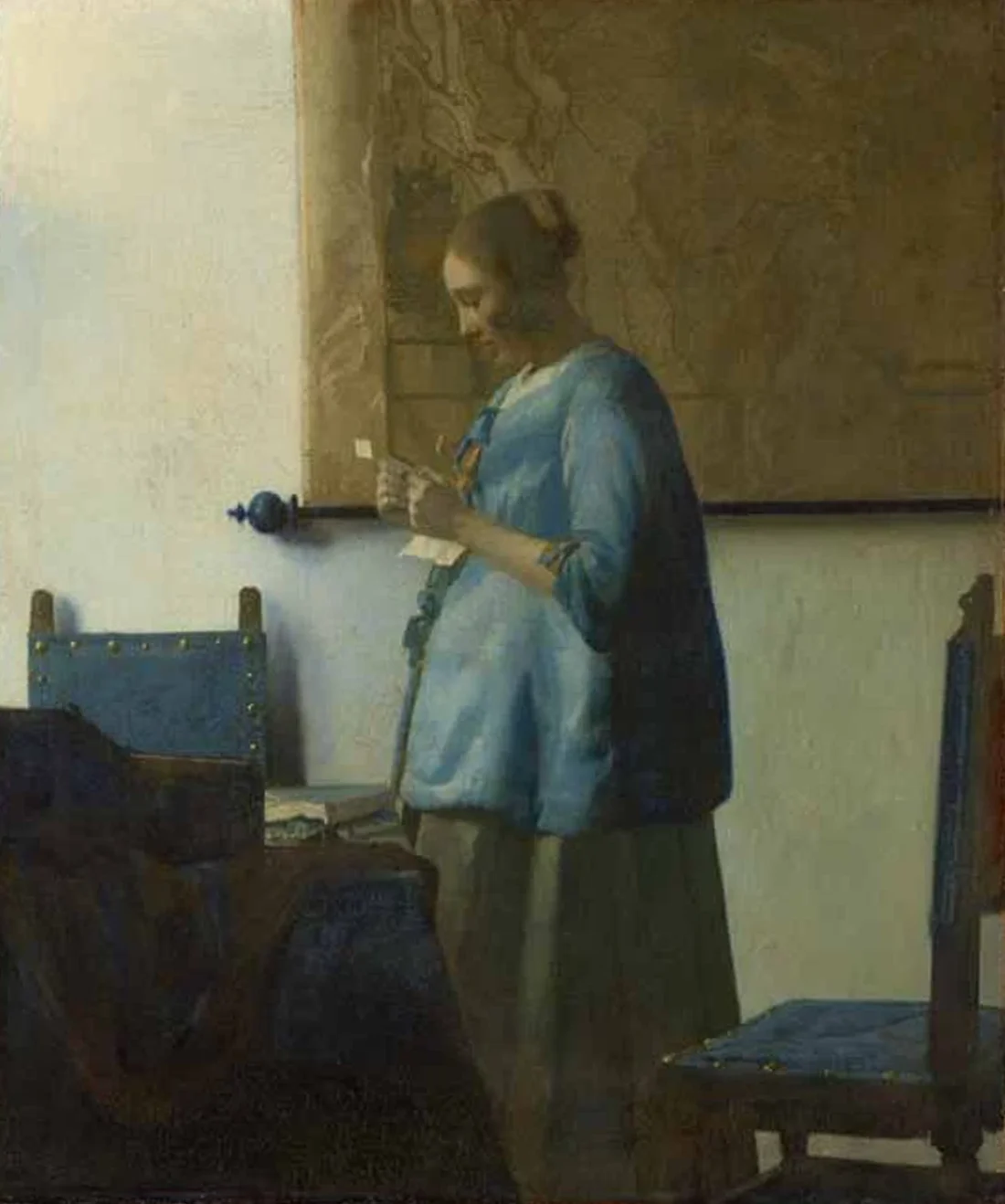 Woman in Blue Reading a Letter before the 2010 to 2011 restoration, the whole room warm and muddy under a thick yellowed varnish