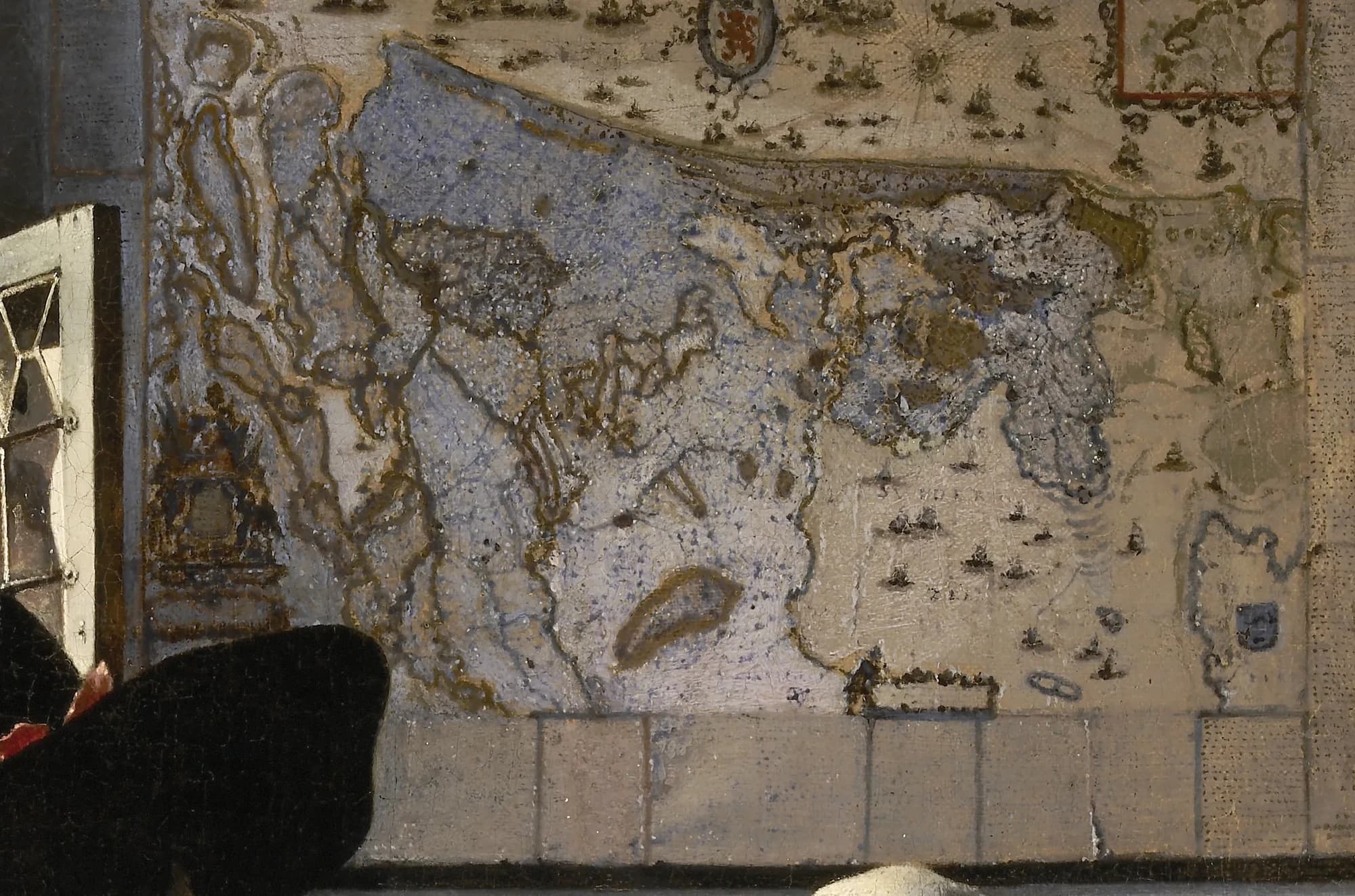 Detail of the painted map of Holland and West Friesland on the back wall of Vermeer's Officer and Laughing Girl